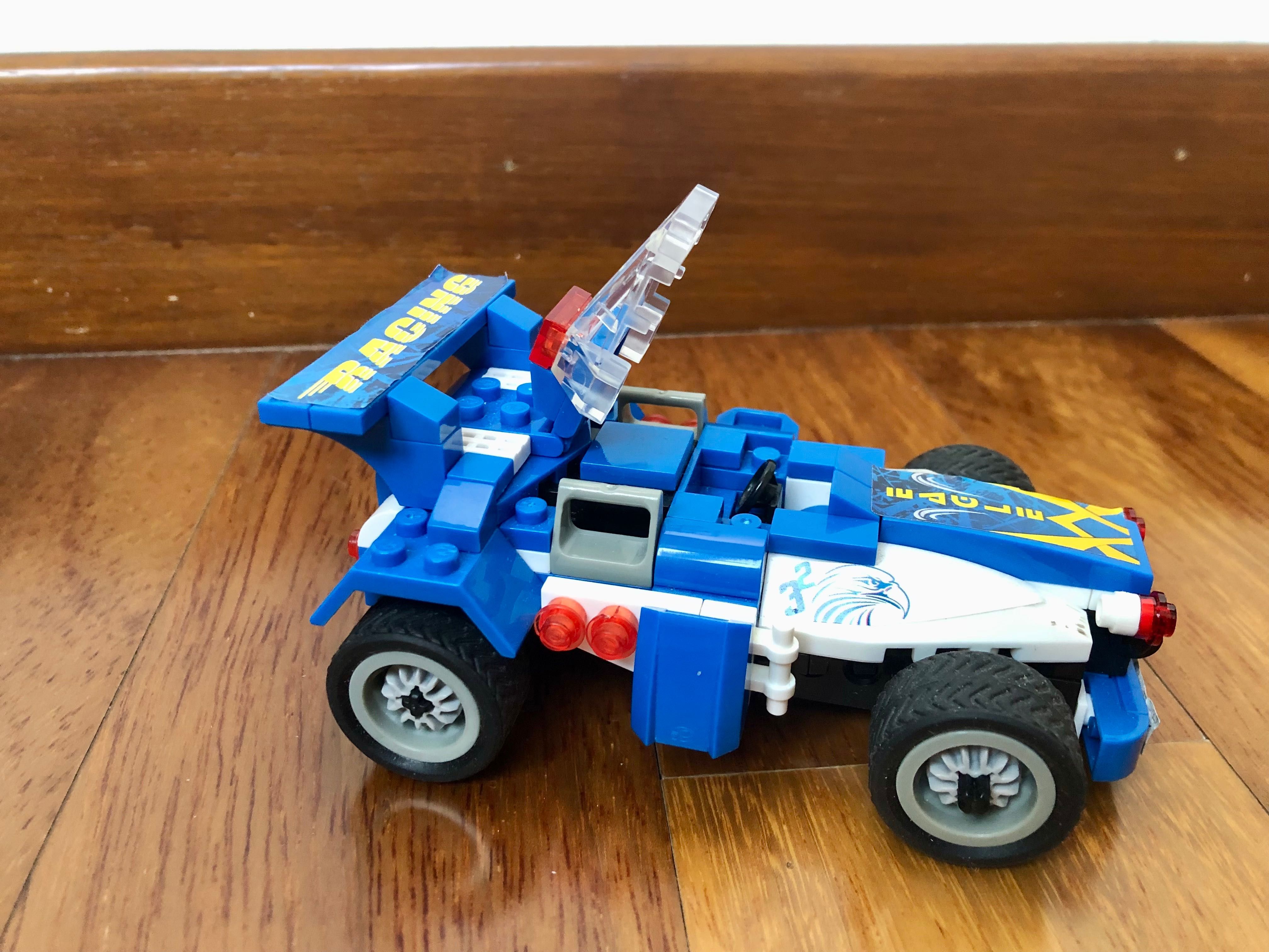 BanBao - Mașină de curse F1 cu pull-back (arc), albastru, 125 de piese
