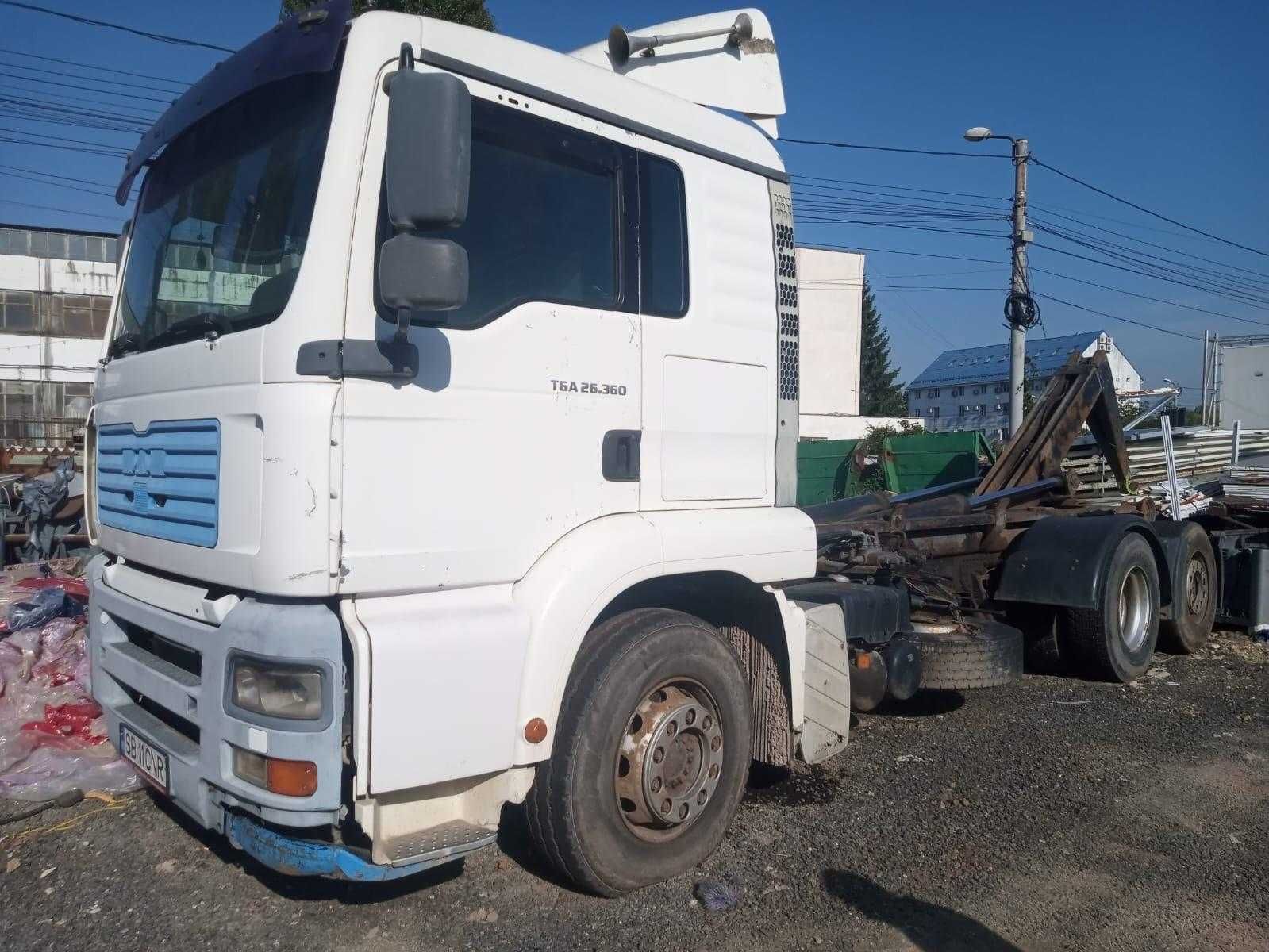 Camion cu carlig MAN TGA cu sistem abroll pentru container