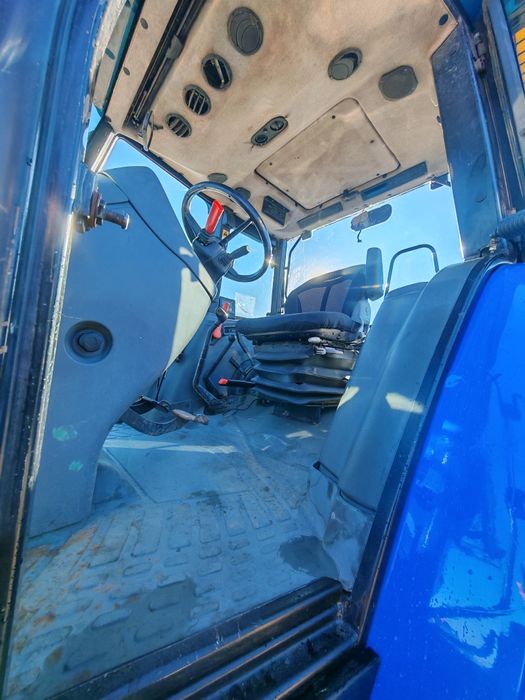 Tractor New Holland Tl 100 cu încărcător frontal quicke q 56