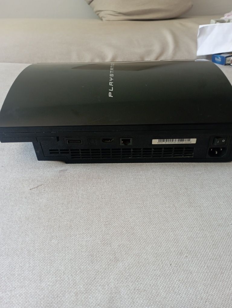 PS3 o maneta și jocurile din imagini