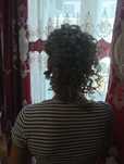 Coafat par la domiciliu bucle afro