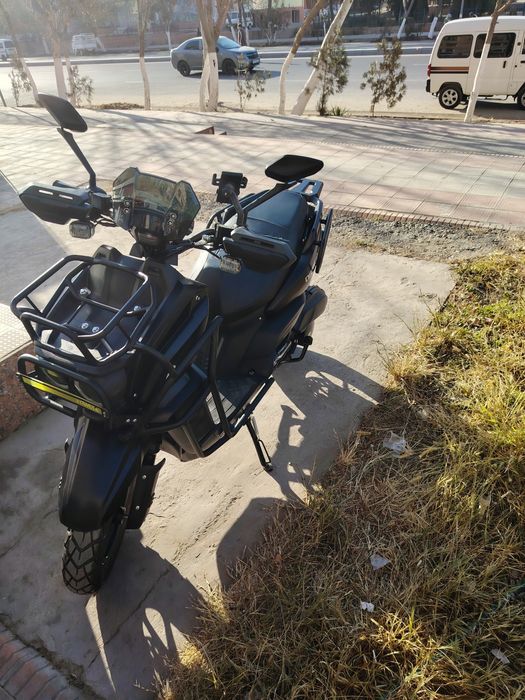 Скутер почти тозо 600 км юрди 150 куб