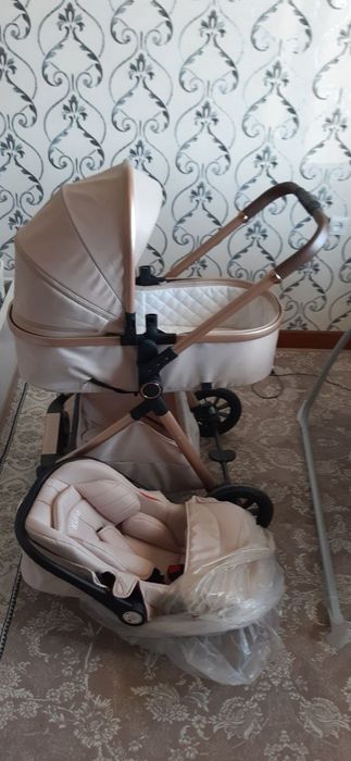Sotiladi Bolalar Kalyaskasi va Elektron Belanchak