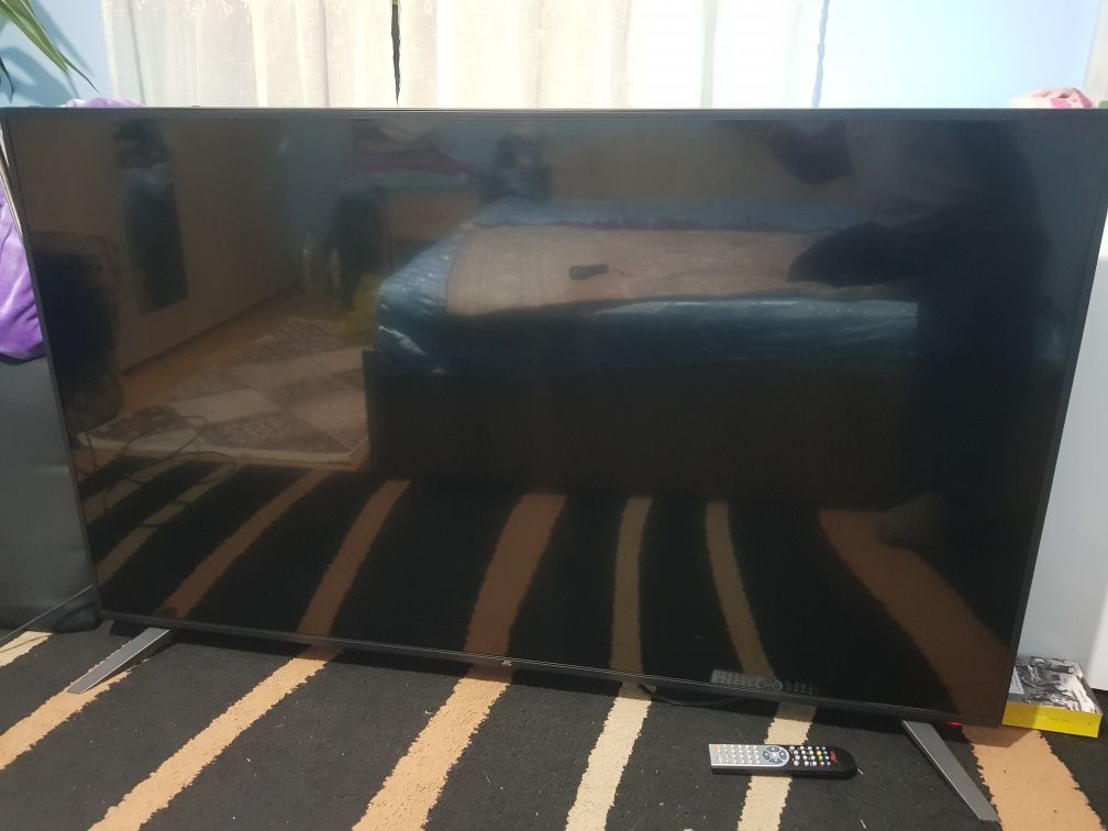 Vând  Tv led JTC 65".(167 cm)