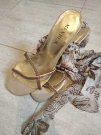 Sandale de ocazie,aurii,se leagă pe gleznă ,toc de 7 cm.