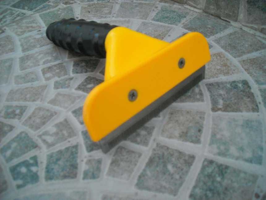 Гребен-премахва линеещата козина