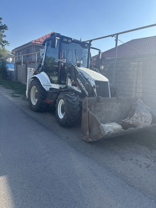 Услуги экскаватор-погрузчика 3в1 гидромолот