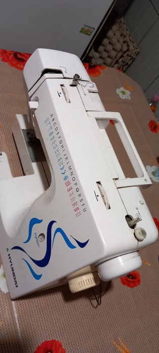 Mașină  de. Cusut