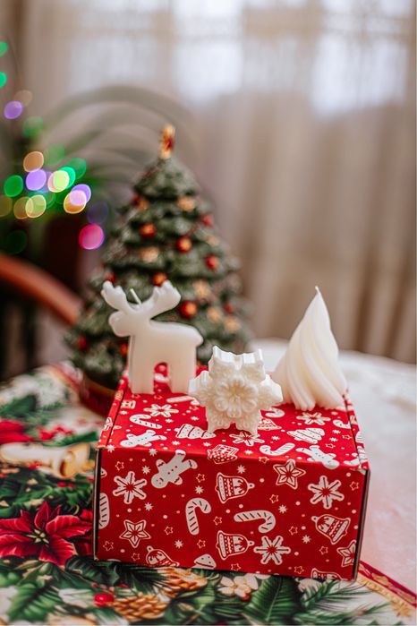 Новогодние подарочные наборы свечей