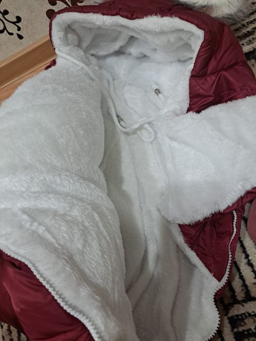 Продам зимний конверт новый шапочка в подарок