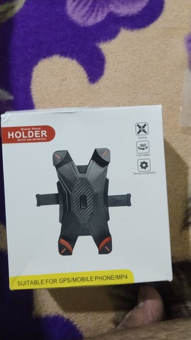 Продам телефон держатель новый