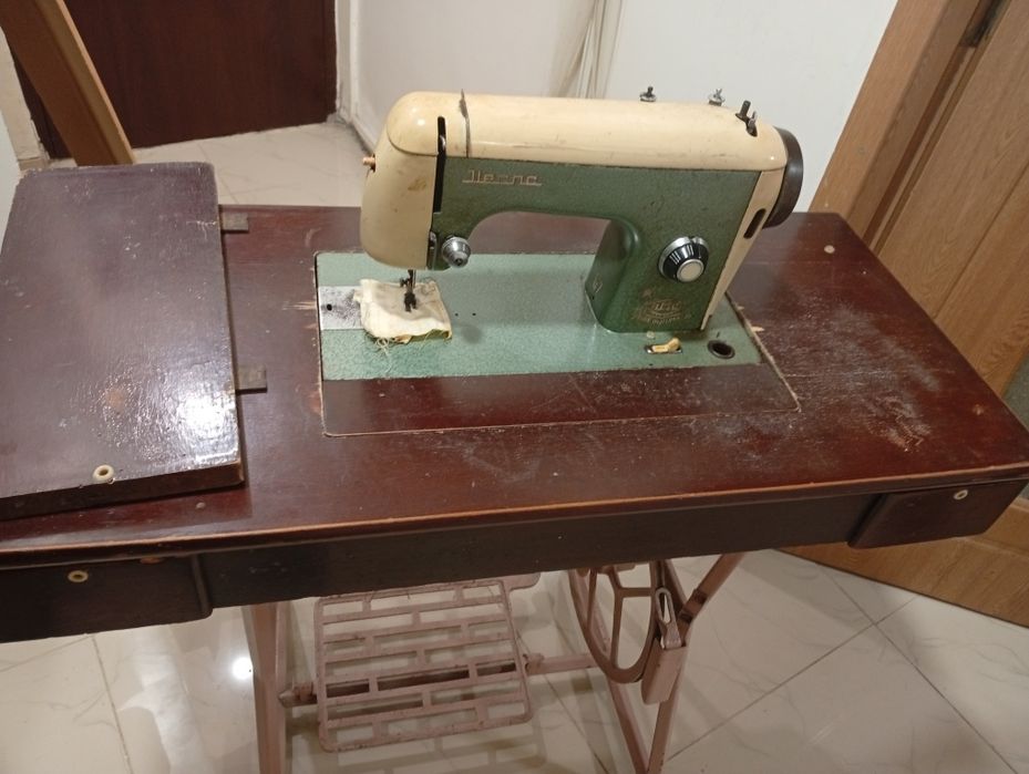 Mașini de cusut singer