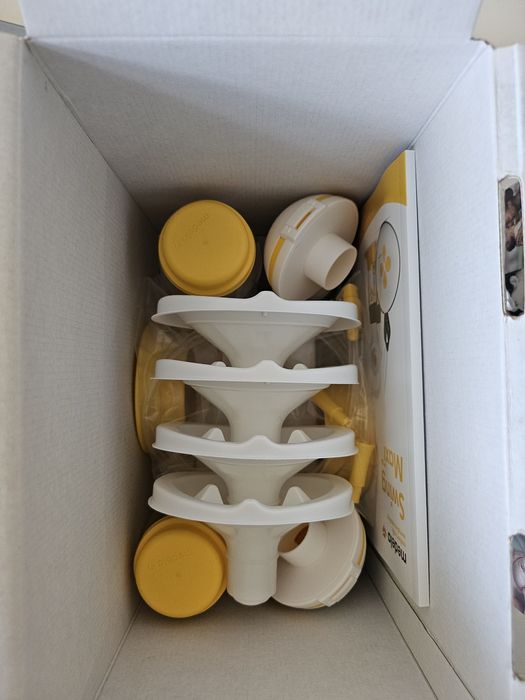 В гаранция! Medela swing maxi - двуфазна помпа за кърма