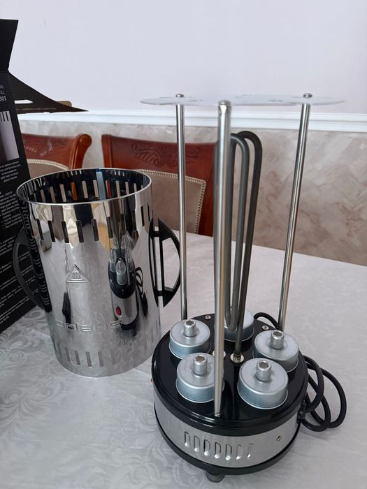 Продается электрошашлычница новый