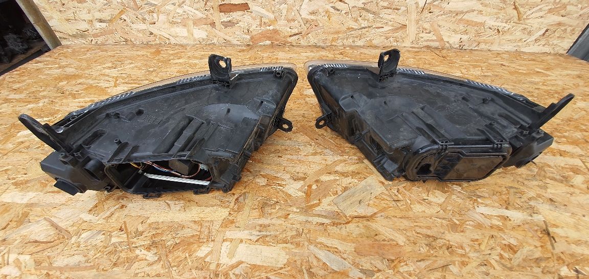 Far/Faruri Audi A6 C6 model 2004-2009 Originale HELLA Preț pe Set