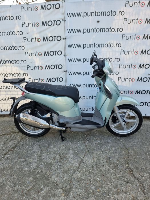 Punto Moto Vinde Scooter 125cc Aprilia scarabeo  [Honda]