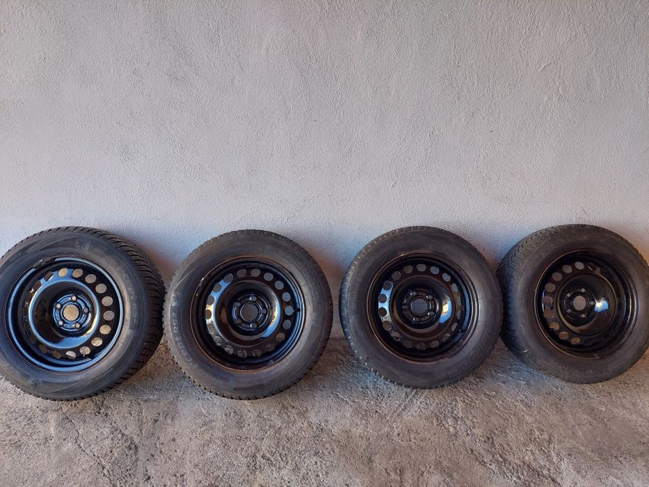 Anvelope iarna cu jante 205  55  r15 + set capace noi