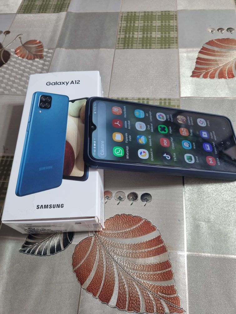 Vand telefon Samsung A12