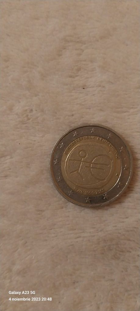 Moneda 2 euro cu defecte