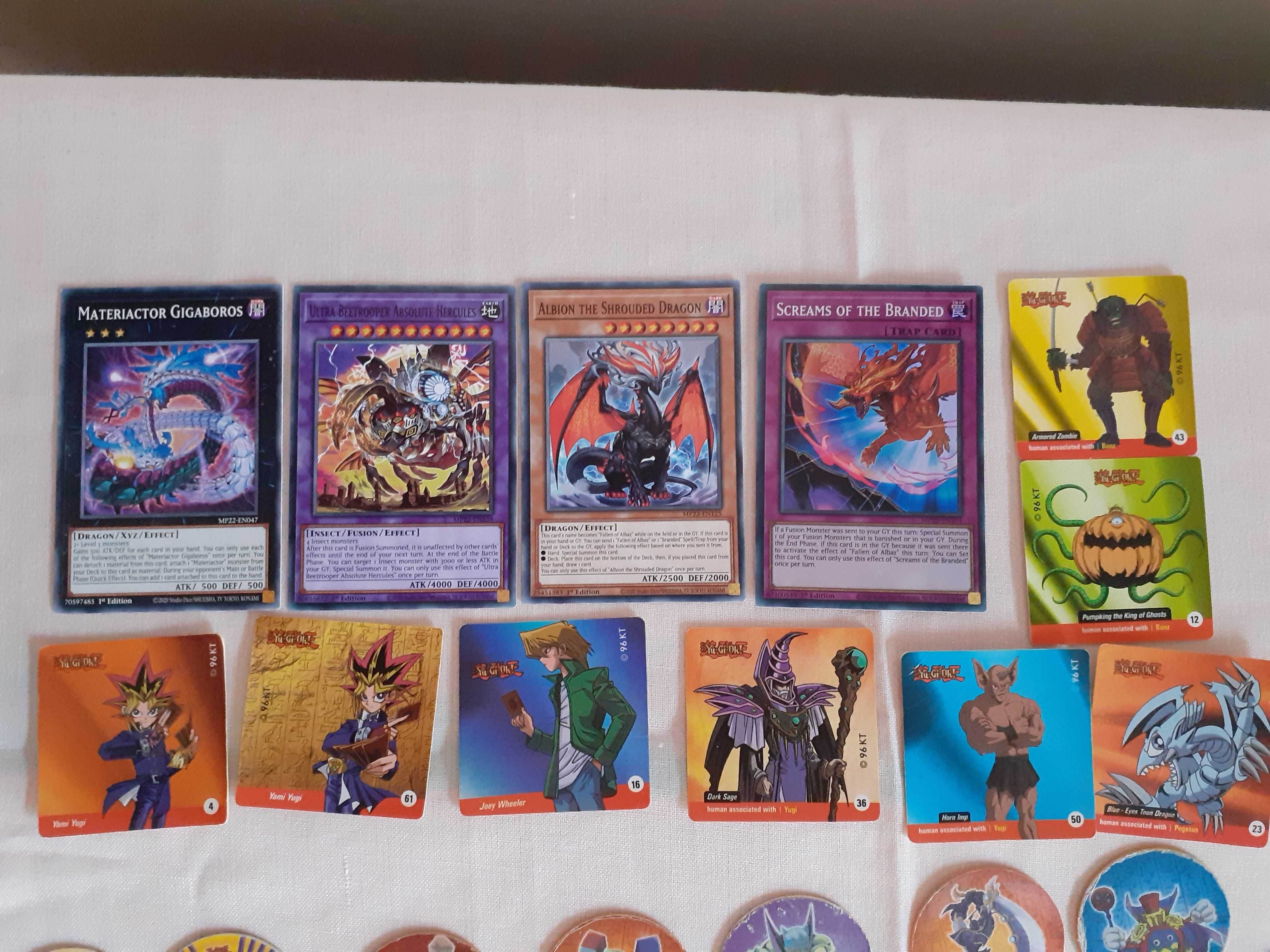 Продавам Yu GI Oh карти, тазота, стикери