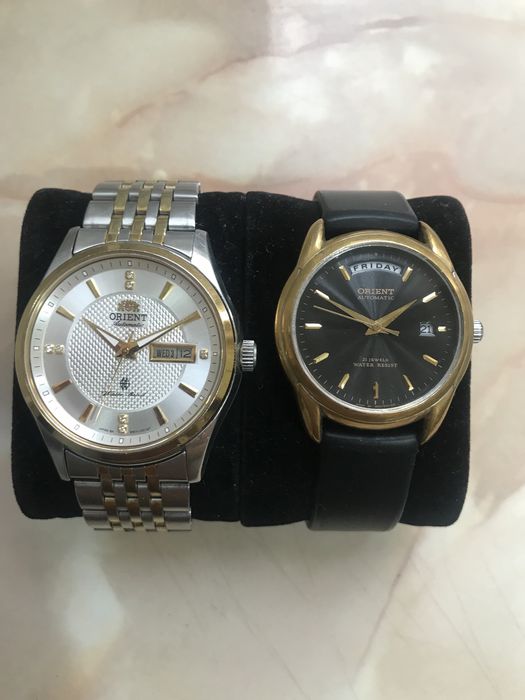 2 автоматични часовника Orient Day Date