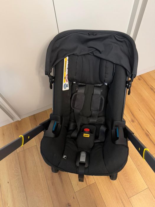 Scoica auto Doona i i-Size black transformabila in carucior