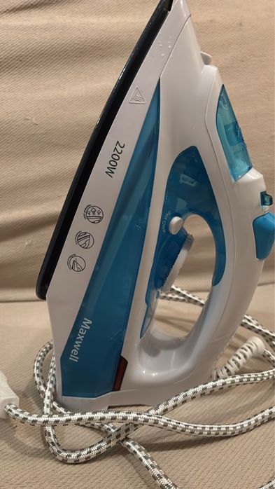 Продам утюг новый без коробки Maxwell 3055
