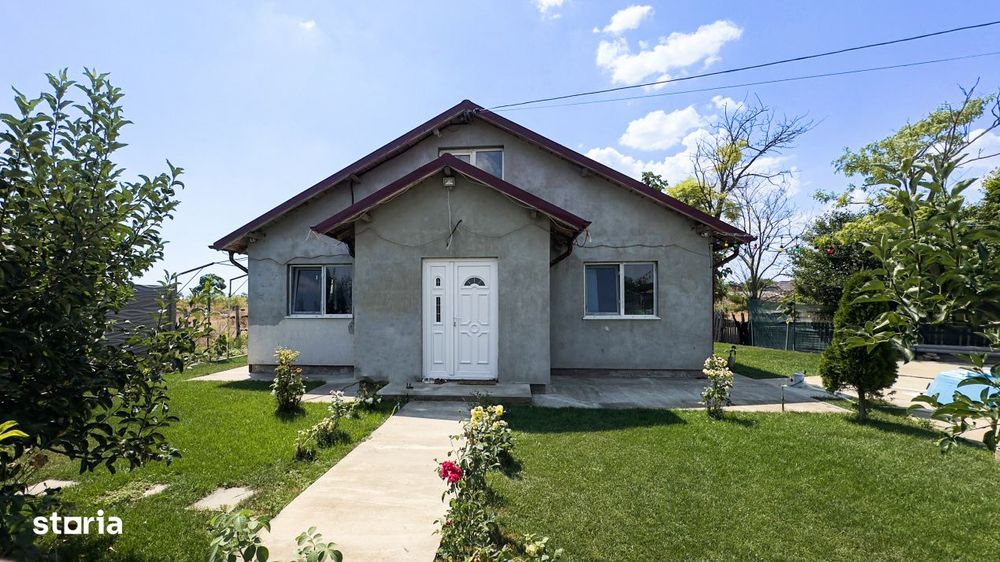 Casa cu 4 camere si garaj cu rampa-teren 500 mp-jud. Constanta