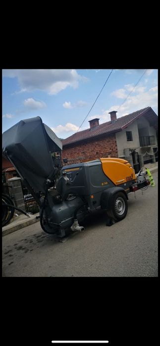 машина Putzmeister  M740 и робот