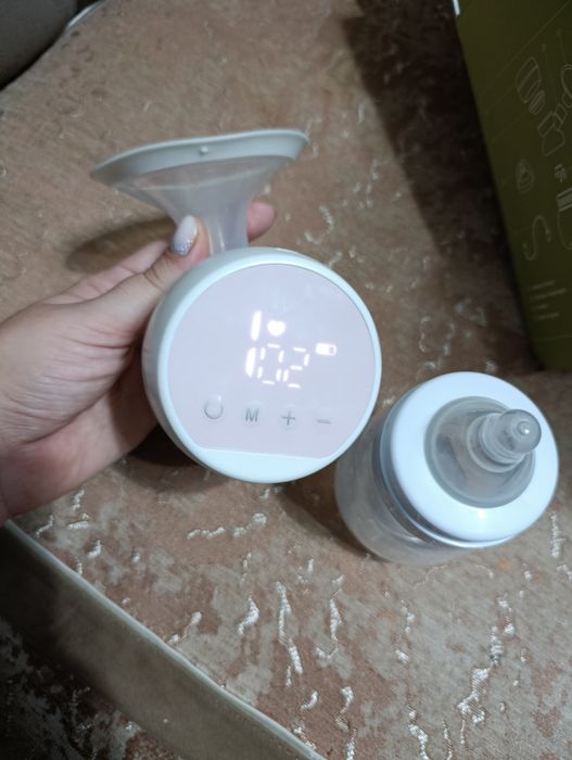 Электронный молокоотсос