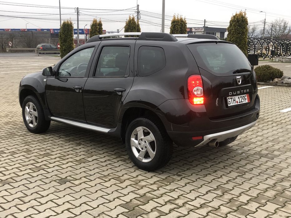 Dacia Duster an 2013 motor 1.6 16v benz+gaz de fabrica clima piele