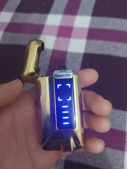 электронный зажигалка