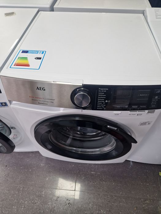Пералня със сушилня AEG 9 кг AutoDos Wi Fi