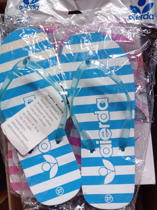 Șlapii de plajă noi