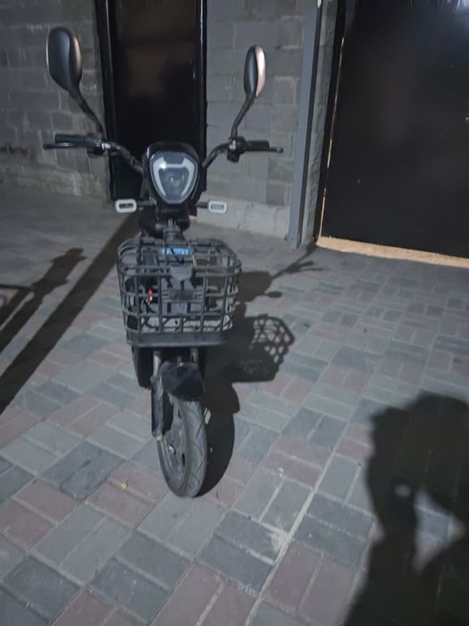 Электроный скутер