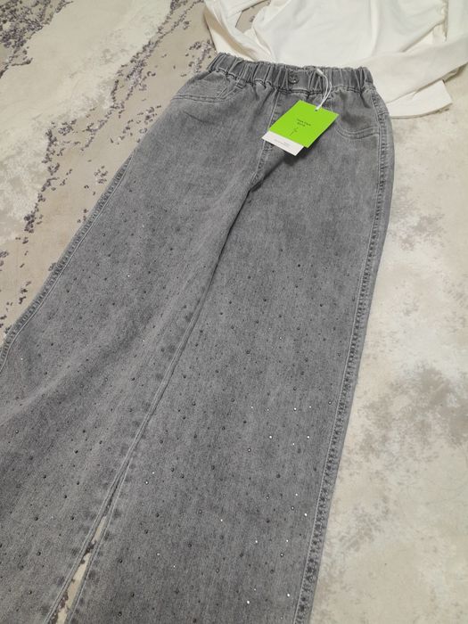 Джинсы на девочку 8-9 лет. новое