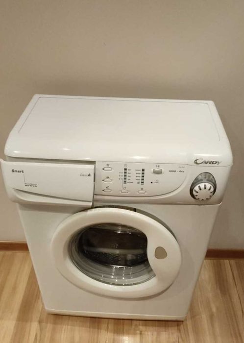 Труп белой стиральной машинки Candy CY2 104