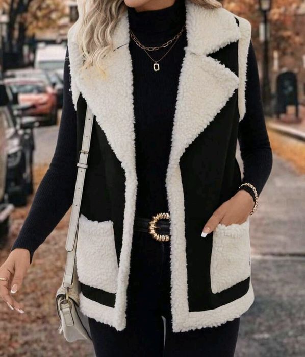 Vând vesta cu blana