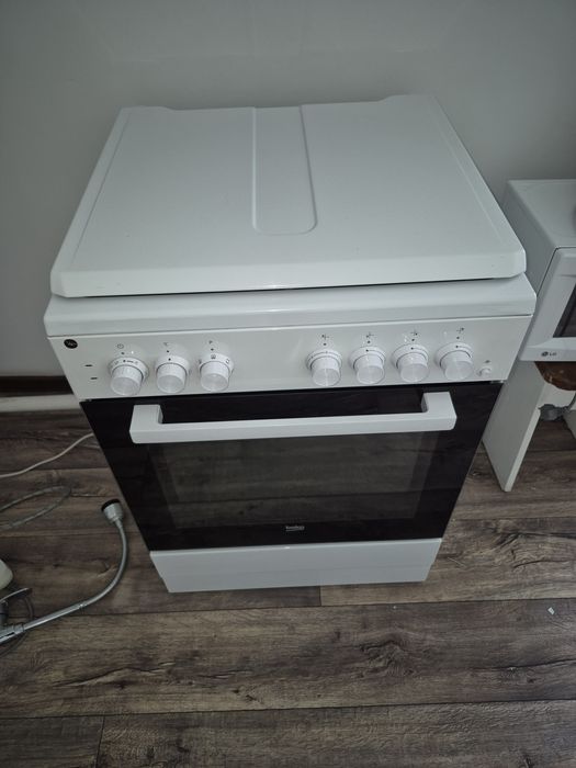 Газ плита новый.