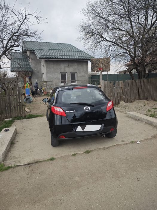 Mazda 2  benzină sau schimb