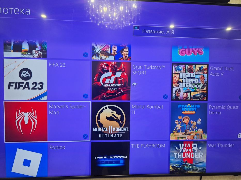 Продам б/у PS 4 с играми