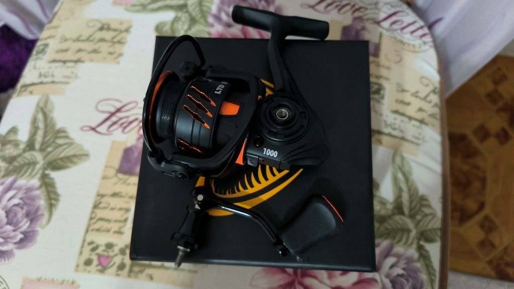 Savage Gear Orange LTD 1000 FD Макара