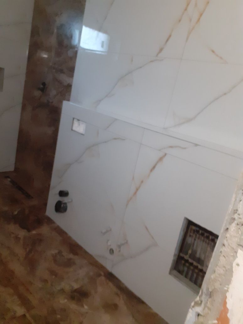 Execut lucrari de gresie, faianta ,rigips, glet, electricitate,