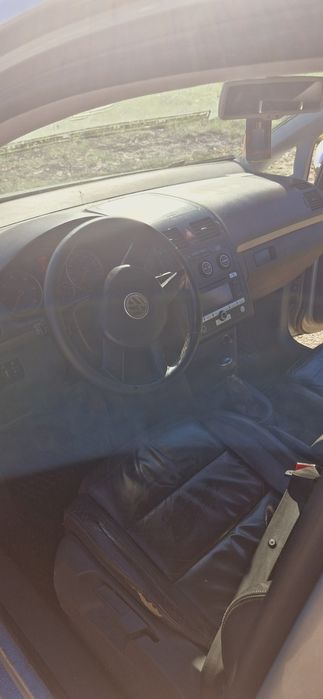 Vand touran 2007 sau schimb cu t4 doka