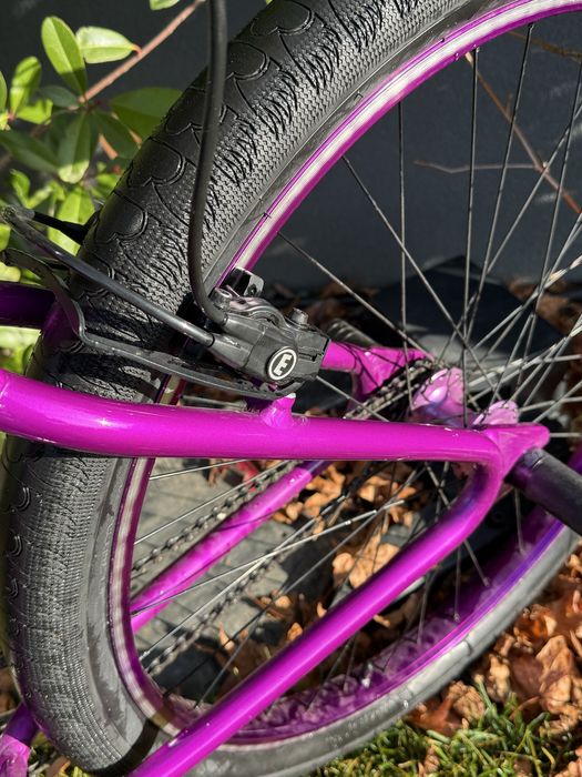 SE bike wheelie , purple rain