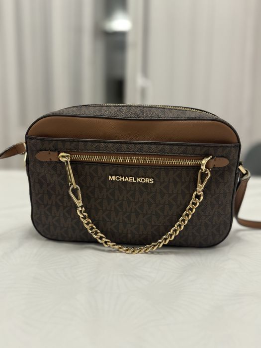 Продам сумку от Michael kors оригинал все замки все работает