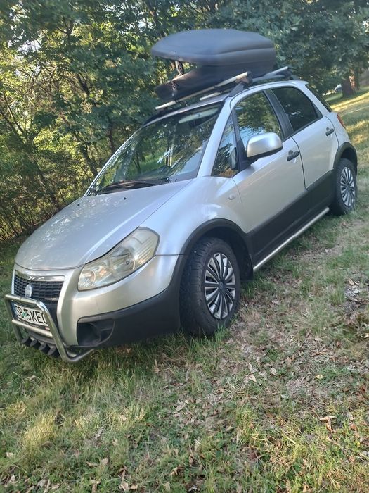 Vând sau schimb fiat sedici cu Renault kangoo