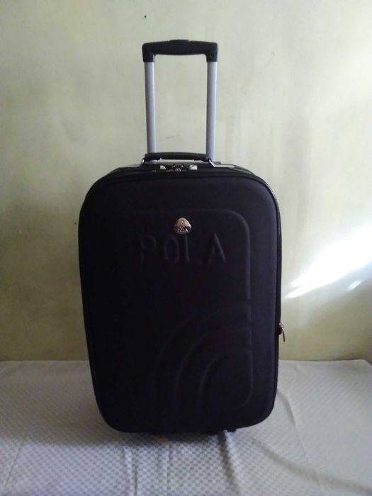 Куфар с колелца и телескопична дръжка