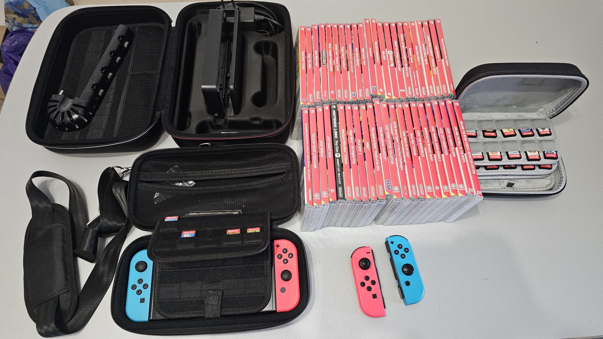 Vannd Nintendo Switch Oled+44 jocuri+Extra JoyCon+Travel Case+Carry