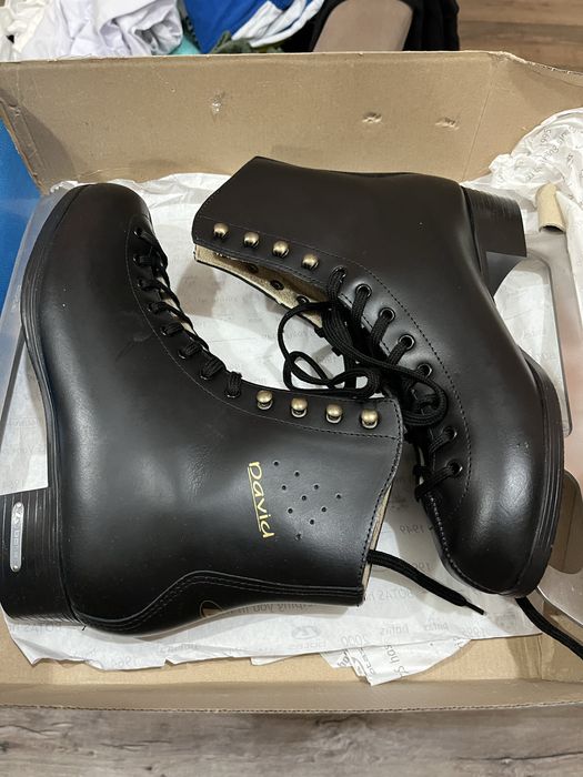 Продам коньки, мужские, новые.